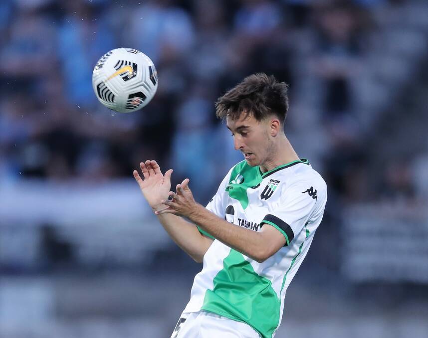 Heading down: United's Luke Duzel heads the ball during the A-League match against Sydney FC on March 10. Picture: WUFC