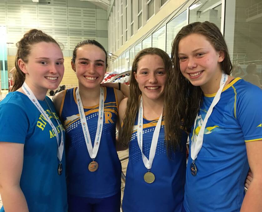 Golden double: Riverside Aquatic relay team of Emily Lonergan, Jess Shaw, Chelsea Savage and Myra Donnelly.