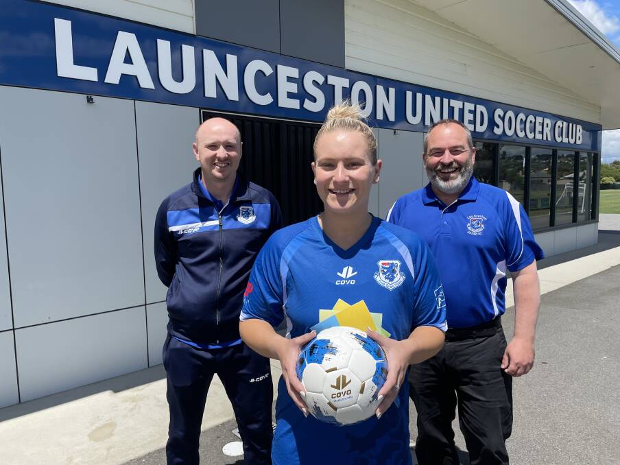 Singing the blues: Launceston United signing Ellie La Monte with co-coach Frank Compton and president Anthony Coulson. Picture: Rob Shaw