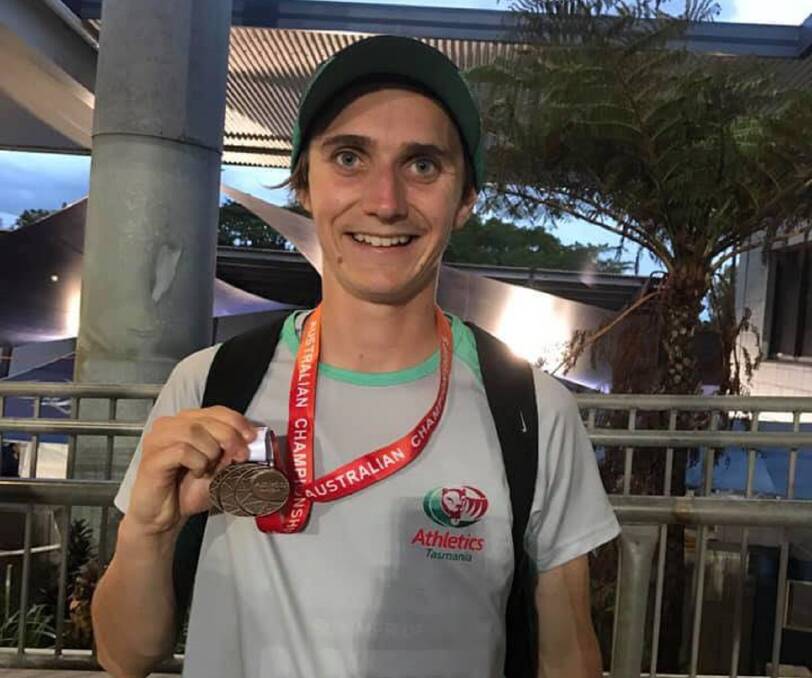 Spoils of victory: Riverside's Sam Clifford with his latest medal at the Australian All-Schools Athletics Championships in Cairns. Picture: Athletics Tasmania