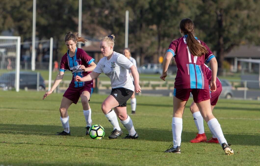 Launceston City's Kiara Walsh and Febey Pearce, of Northern Rangers, in action earlier this season. Picture: Jamie Richardson
