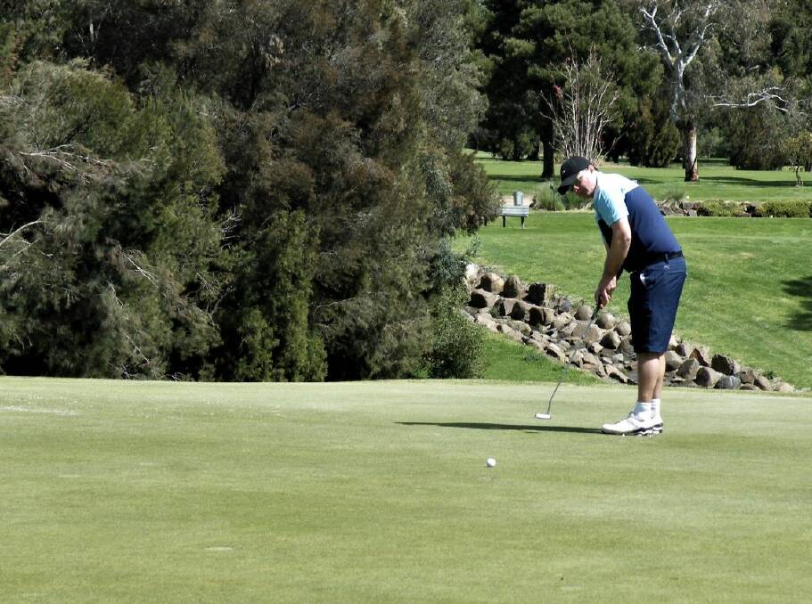 GREEN LIGHT: Brett Churchill in action during Launceston Golf Club's men's championships.