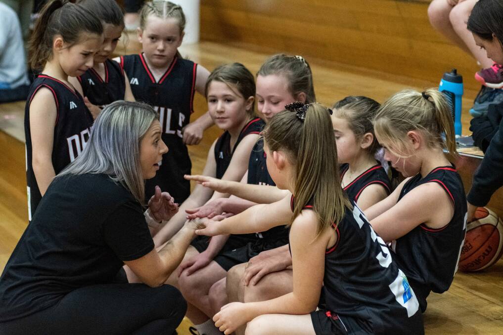 Hands on: Devils Patterson coach Lisa Patterson imparts advice during the state basketball tournament at Elphin Sports Centre. Picture: Phillip Biggs