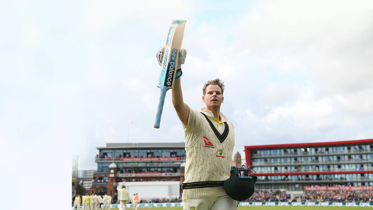 Old habits: Australian batsman Steve Smith acknowledges the applause after being dismissed for 211 runs in the Ashes Test match at Old Trafford. Pictures: Getty Images