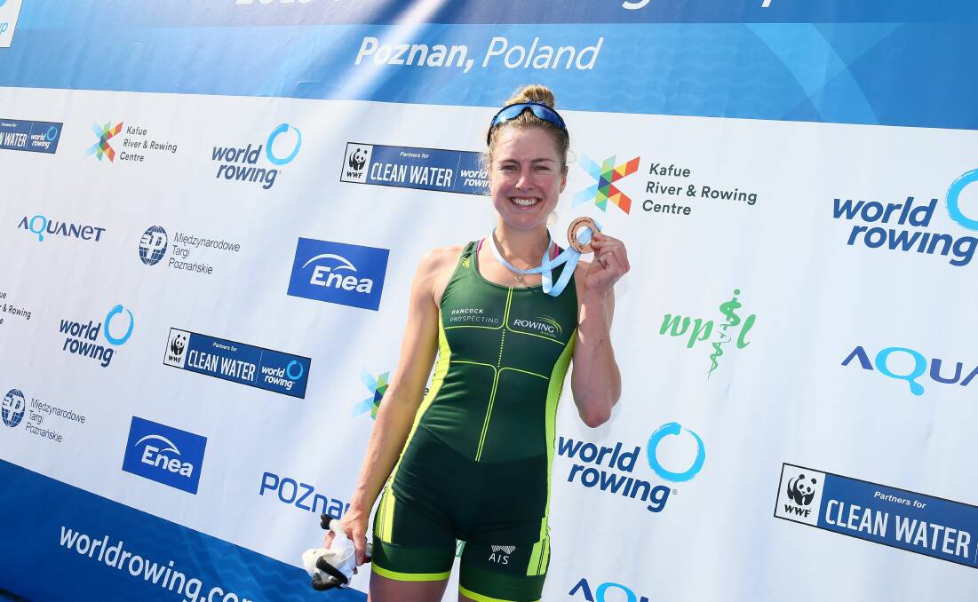 Pole position: Tasmanian Georgia Nesbitt with her bronze medal in Poland. Pictures: Rowing Australia
