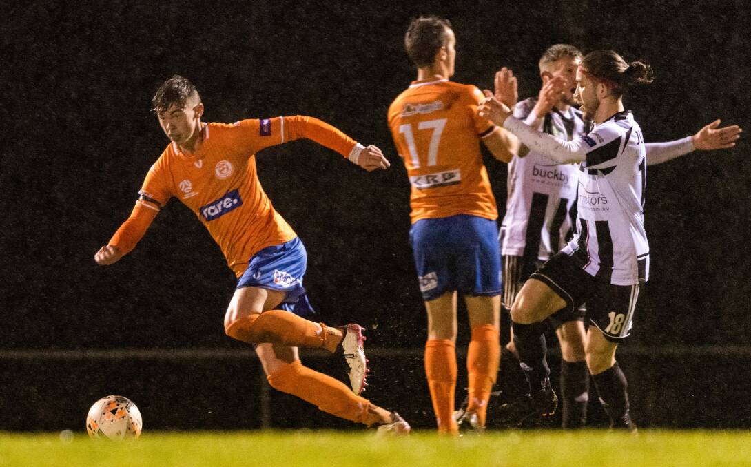 Max power: Max Reissig on the charge against Launceston City. Picture: Phillip Biggs