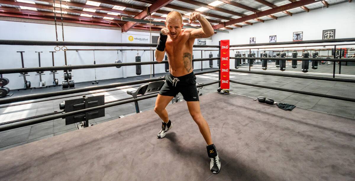 Fight club: Luke Jackson training at his gym in Glenorchy. Picture: Scott Gelson