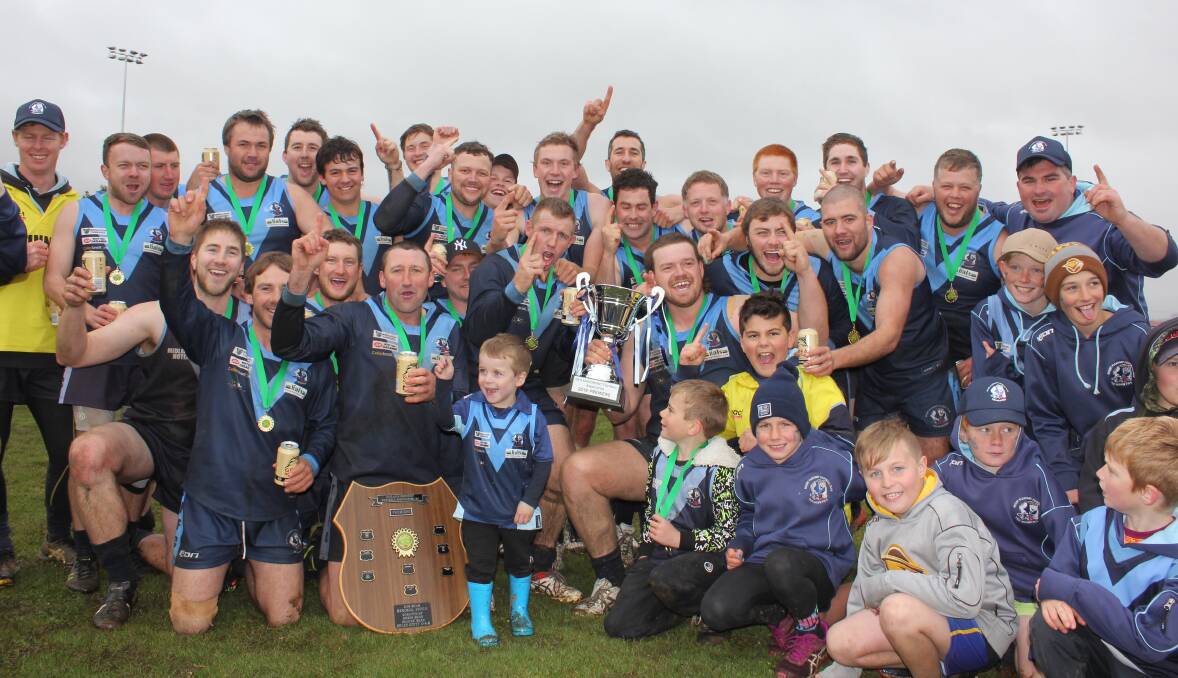 Bean there, done that: Mount Pleasant players celebrate with the premiership cup and Ron Bean Memorial Shield.