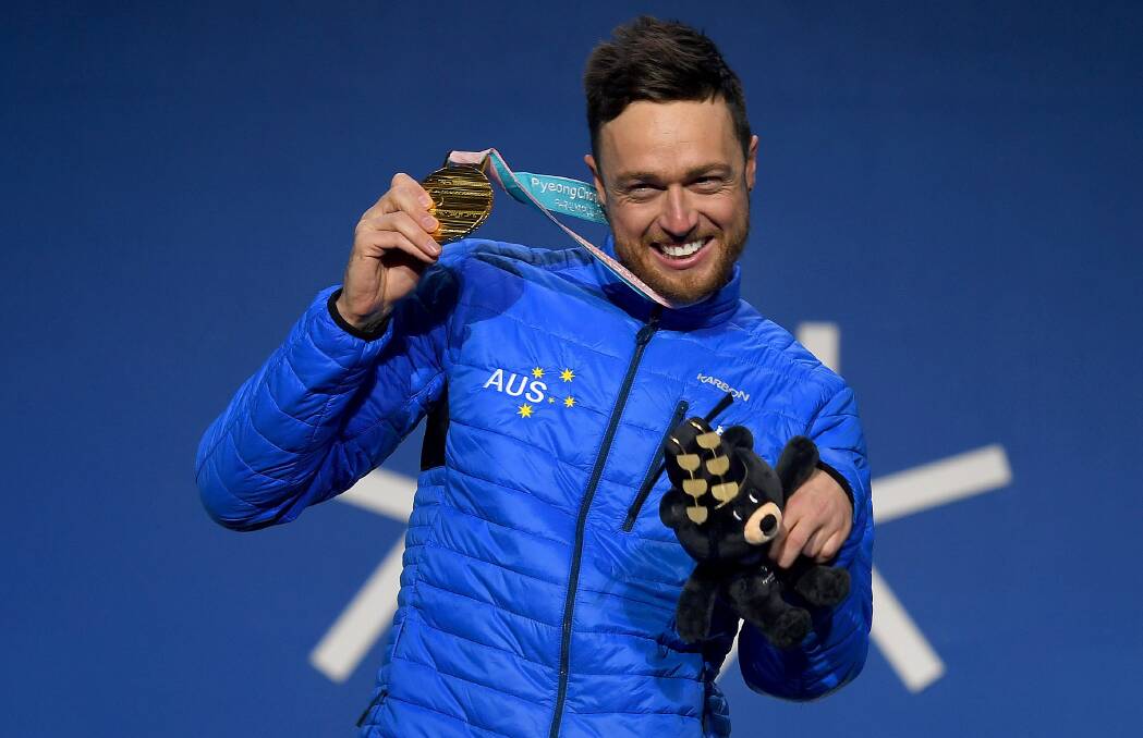 Simon Patmore celebrates with his gold medal. Picture: AAP