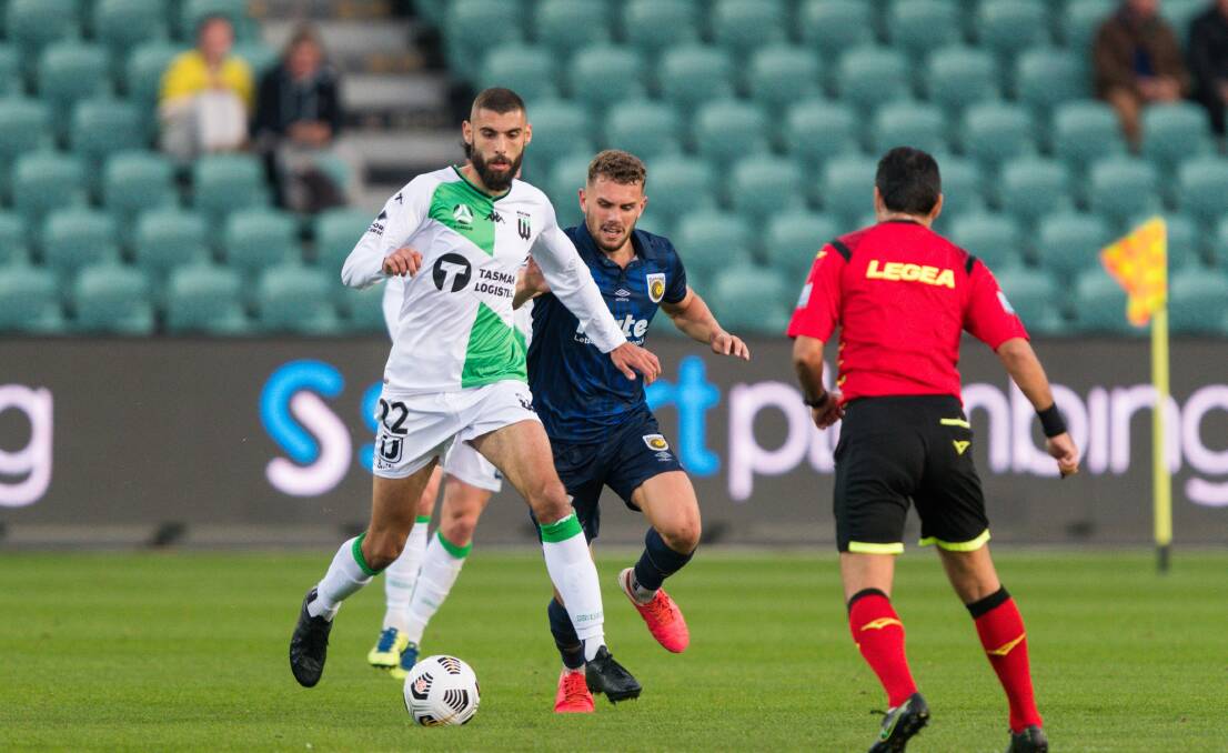 On the charge: Tomislav Uskok on the attack for Western United in their 1-0 win over Central Coast Mariners in Launceston on Saturday. Picture: Phillip Biggs