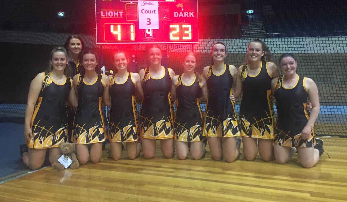 SHINING LIGHTS: Gee Tees are all smiles after winning their grand final. Pictures: Rob Shaw