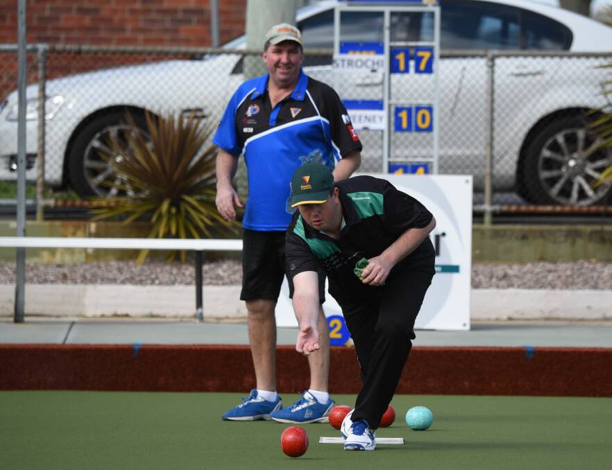 GAME ON: Rosny bowler Michael Sweeney watches Longford rival Mark Strochnetter at the Bill Springer Mad Dog singles invitational at East Launceston. Picture: Paul Scambler