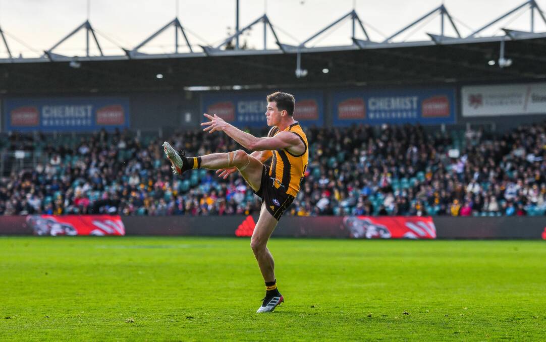 Free kick: Jaeger O'Meara in action for Hawthorn against Brisbane at Launceston's UTAS Stadium in July 2019. Pictures: Scott Gelston