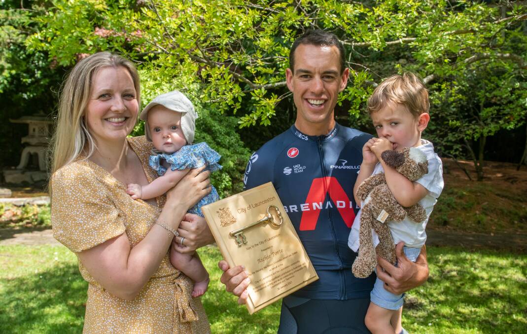 Key contributor: Richie Porte's year has gone well since being presented with the key to Launceston on his 36th birthday in January. He is pictured with wife Gemma, daughter Eloise and son Luca. Picture: Paul Scambler
