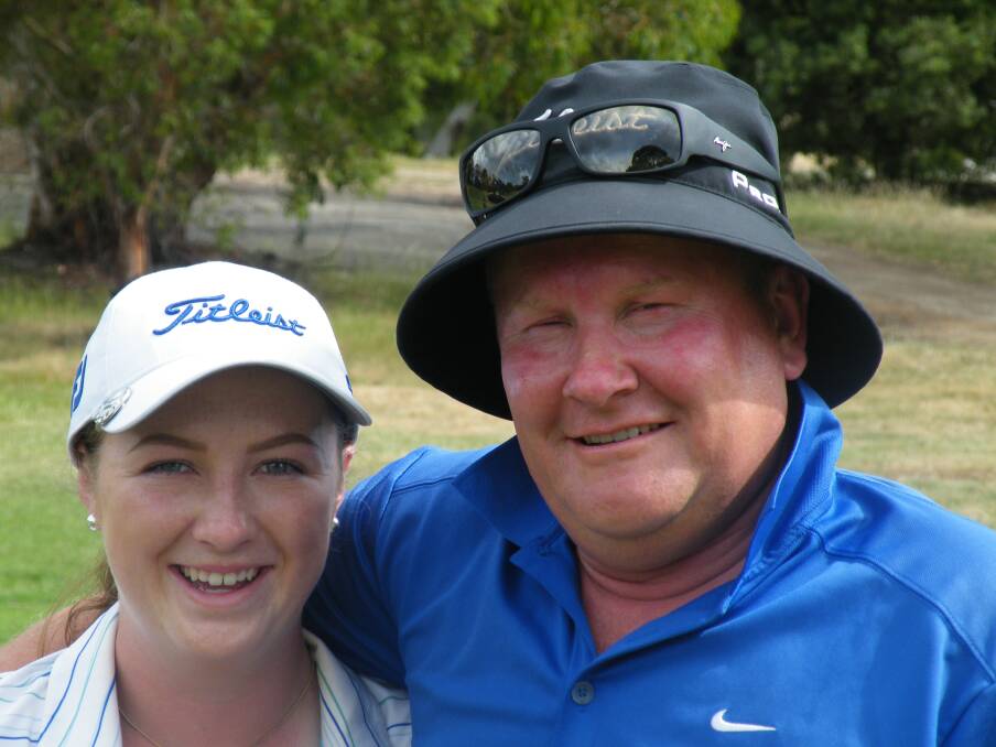 Family ties: Junior girls' 36-hole winner Lily Caelli with her dad and caddy Alan.