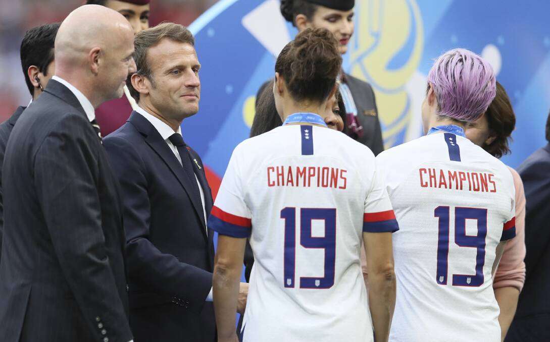 Setting a precedent: Emmanuel Macron ponders whether the Americans would have sold those shirts on eBay if they had lost.
