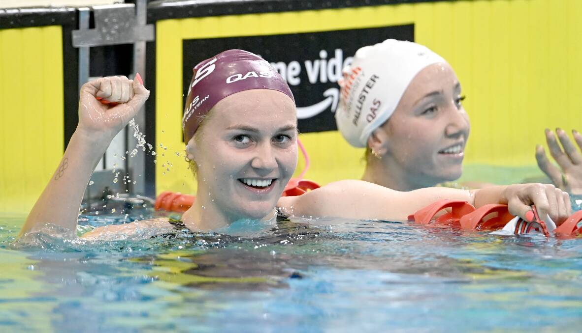 Free call: Ariarne Titmus celebrates breaking the 400m freestyle world record at the Australian championships in Adelaide. Picture: Delly Carr