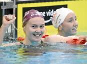 Free call: Ariarne Titmus celebrates breaking the 400m freestyle world record at the Australian championships in Adelaide. Picture: Delly Carr