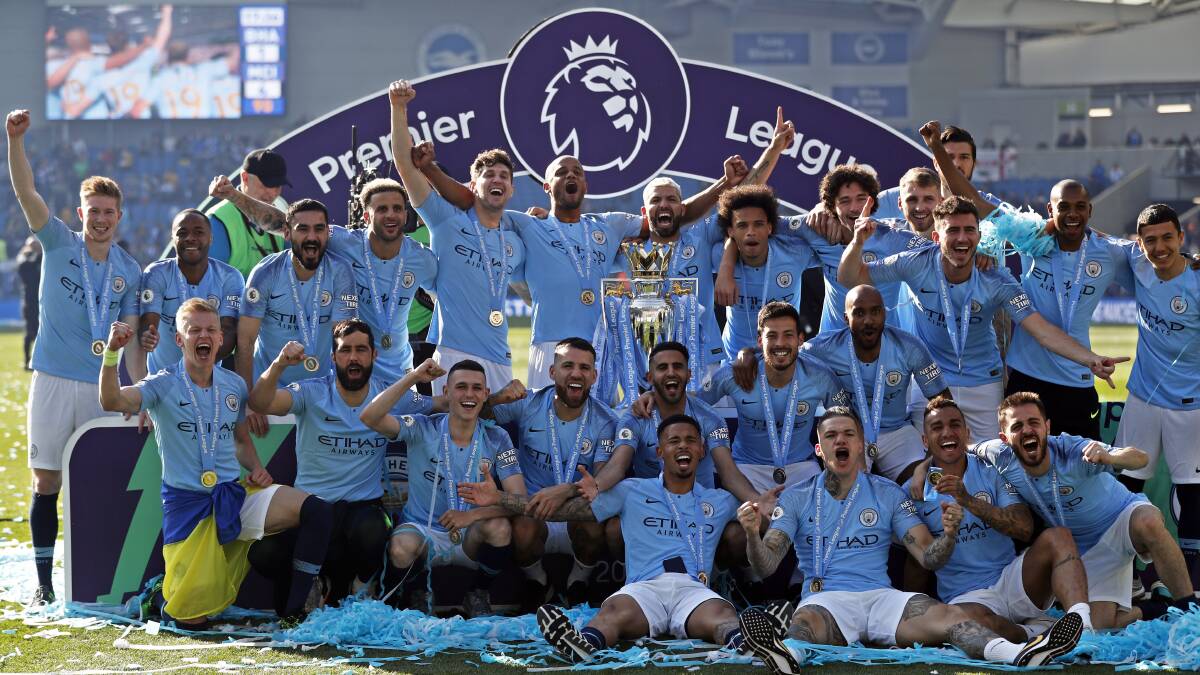 Brighton breezy: A group of mostly non-English footballers celebrate winning the English Premier League title. Picture: AP