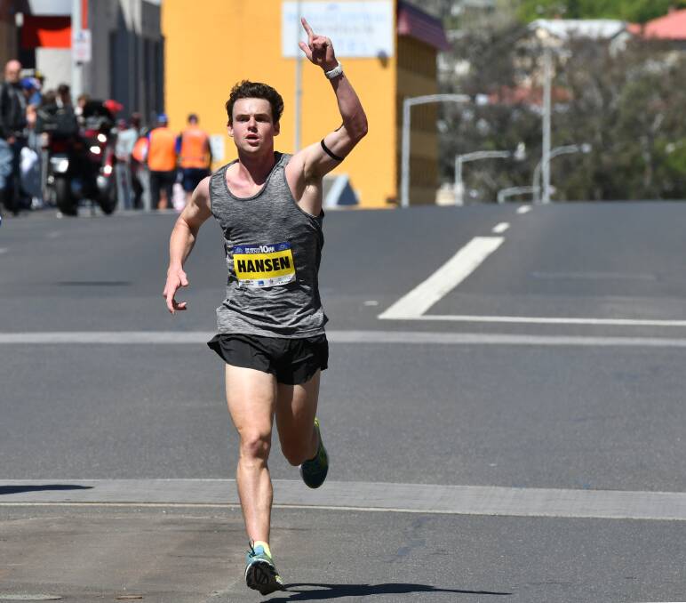 Elation: James Hansen shows emotion as he crosses the Burnie Ten finish line in fifth place overall. Picture: Brodie Weeding.