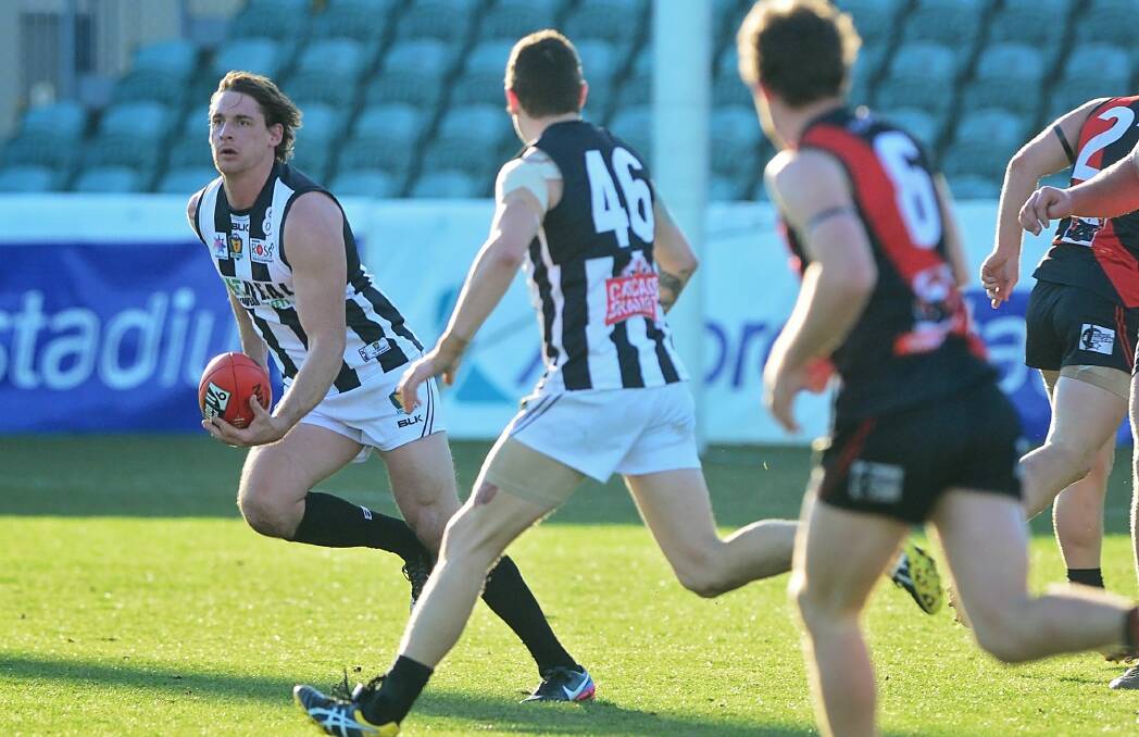 Looking up: Glenorchy's Ben Reynolds on the charge against North Launceston on Saturday. Picture: Phillip Biggs