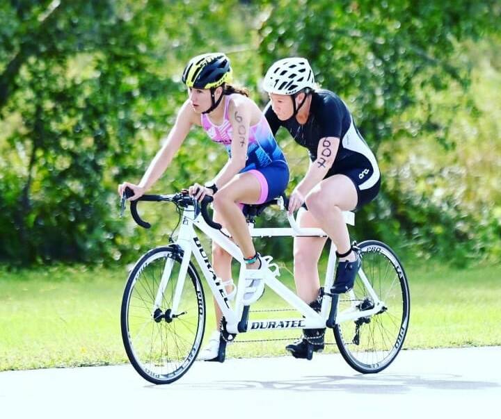 Tandem performers: Burleigh will compete in Birmingham with guide Felicity Cradick, of Queensland.