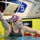 AROUND THE WORLD: Ariarne Titmus savours the moment after clinching the 400-metre freestyle world record. Picture: Delly Carr