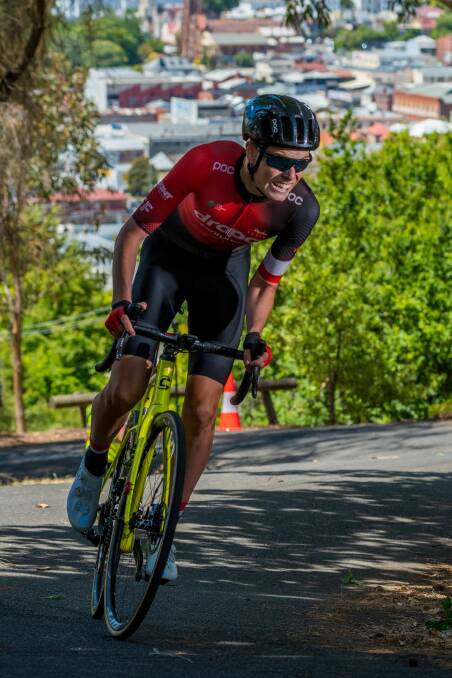New climes: Tasmanian cyclist Zac Johnson shows his climbing skills in the prologue of the Tour of Tasmania up Launceston's Brisbane Street West. Picture: Phillip Biggs 
