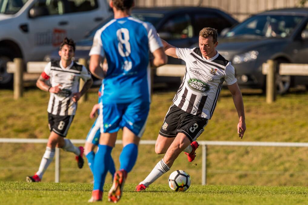 STEPPING UP: New signing Rob Gerrard on the attack for Launceston City against Olympia on Saturday. Picture: Phillip Biggs
