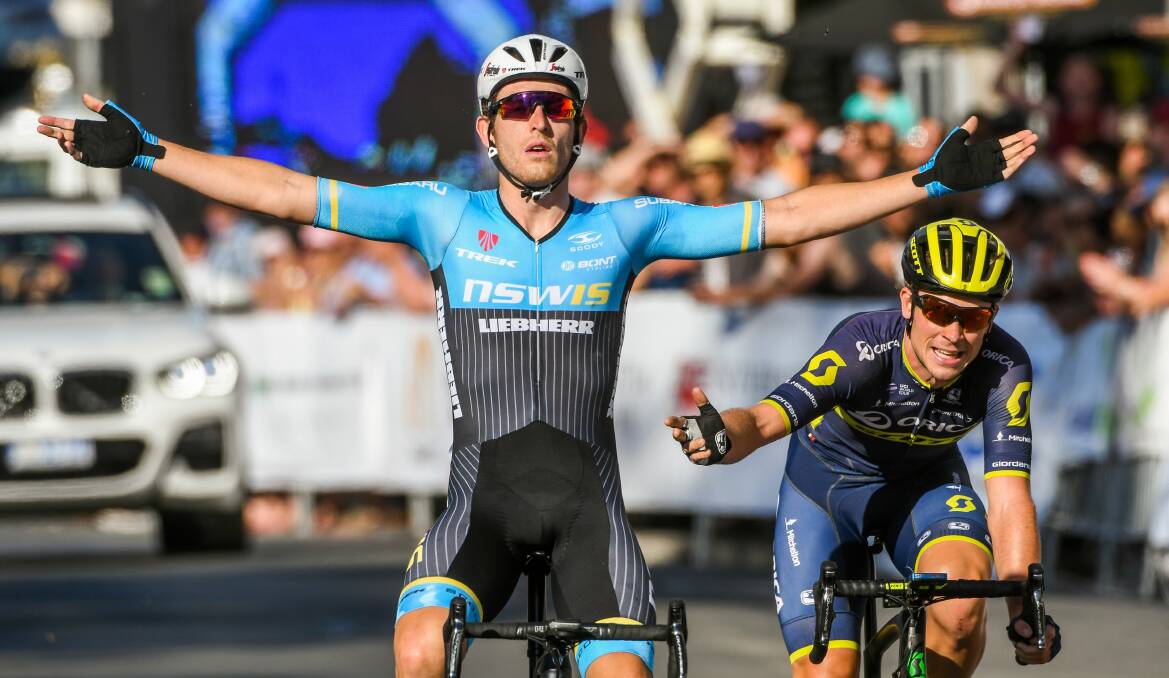 Open arms: Ryan Cavanagh celebrates as Alex Edmondson acknowledges his victory in the Stan Siejka Launceston Cycling Classic. Picture: Phillip Biggs