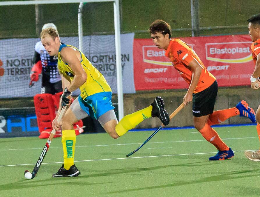 On target: Tasmania's latest Kookaburra Jack Welch in action against Malaysia. Picture: Hockey Australia/Russell Brown