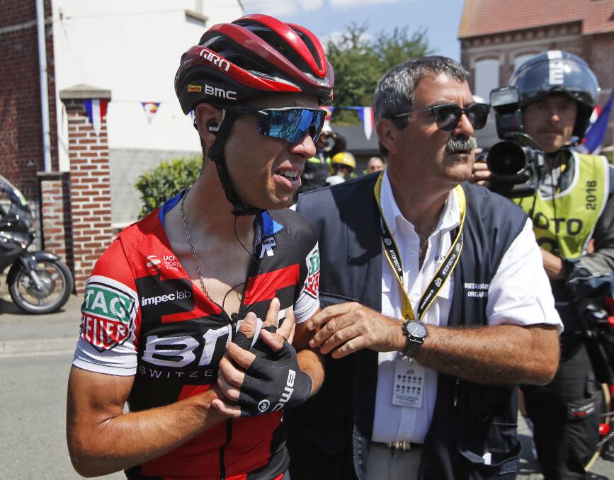 Pain barrier: Richie Porte shows the pain after crashing out of the Tour de France near Arras. Picture: AP