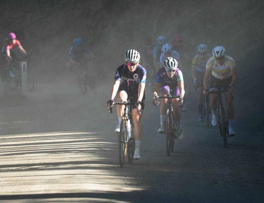Dust storm: Anya Louw in second wheel during the Tour de Tweed in NSW at the weekend. Picture: Veloshotz
