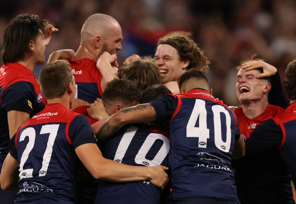 We're Gawn: Ben Brown celebrates the AFL grand final victory with his captain Max Gawn and their Melbourne teammates. Picture: Twitter