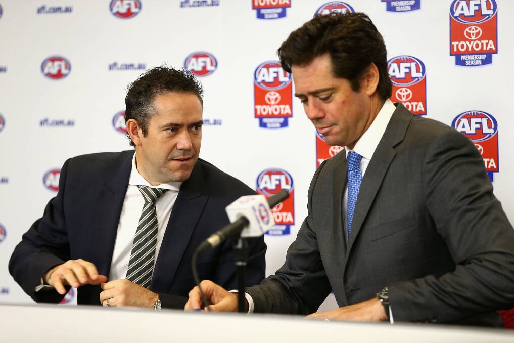Conference call: AFL bigwigs Simon Lethlean and Gillon McLachlan before the scandal. Pictures: Getty Images