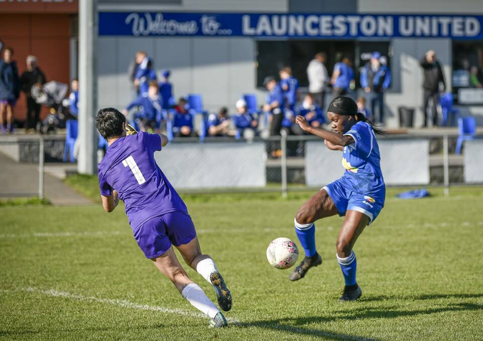 Achieving goals: Launceston United's Gonya Luate on the attack against Taroona in last season's Women's Super League. Picture: Craig George