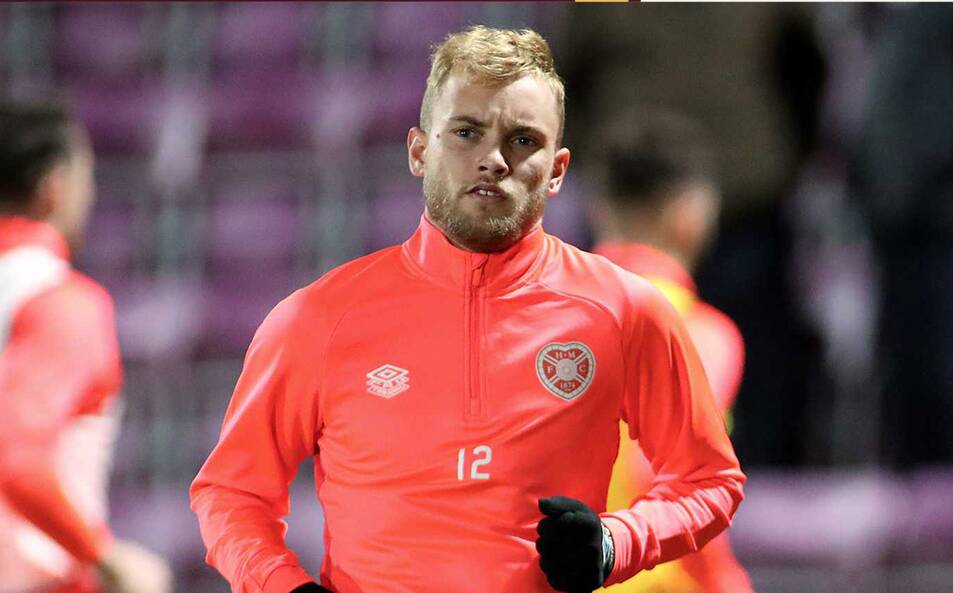 All Hearts: Nathaniel Atkinson warming up before his Heart of Midlothian debut. Pictures: Twitter