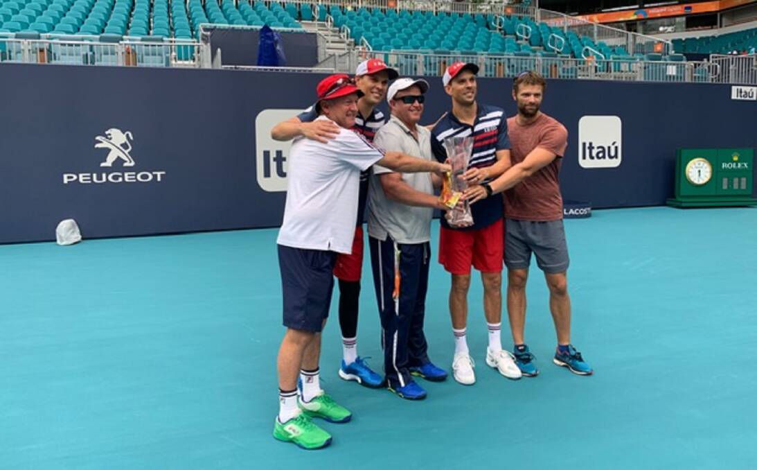 Miami advice: Tasmanian coach David Macpherson (left) celebrating Bob and Mike Bryan's doubles victory in the Miami Open.