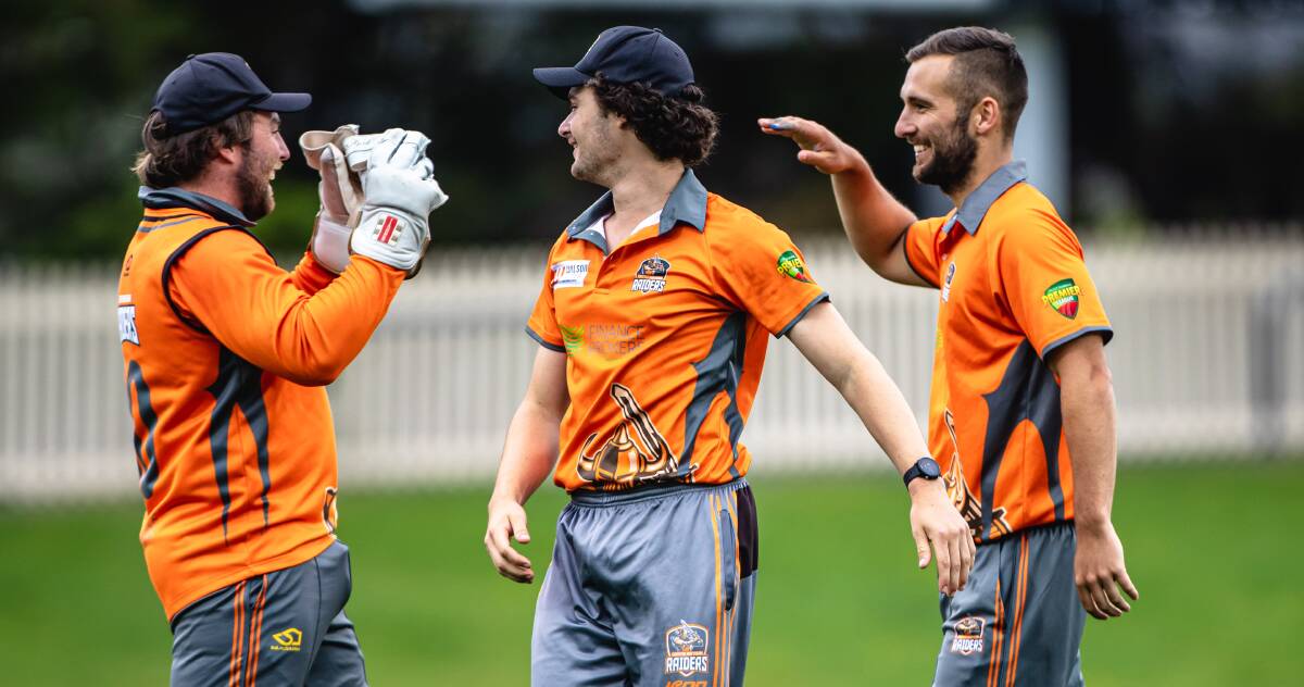 Glove affair: Alistair Taylor, Spencer Hayes and Jono Chapman celebrate a wicket against South Hobart Sandy Bay. Picture: Linda Higginson, Cricket Tasmania