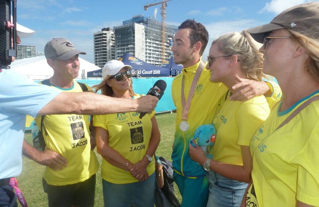 Jake Birtwhistle and his family enjoying the limelight at the 2018 Commonwealth Games on the Gold Coast.