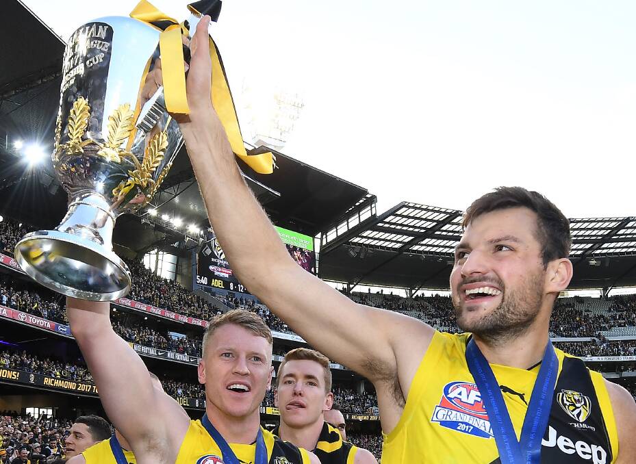 Toby Nankervis celebrates with the premiership cup. Picture: AAP
