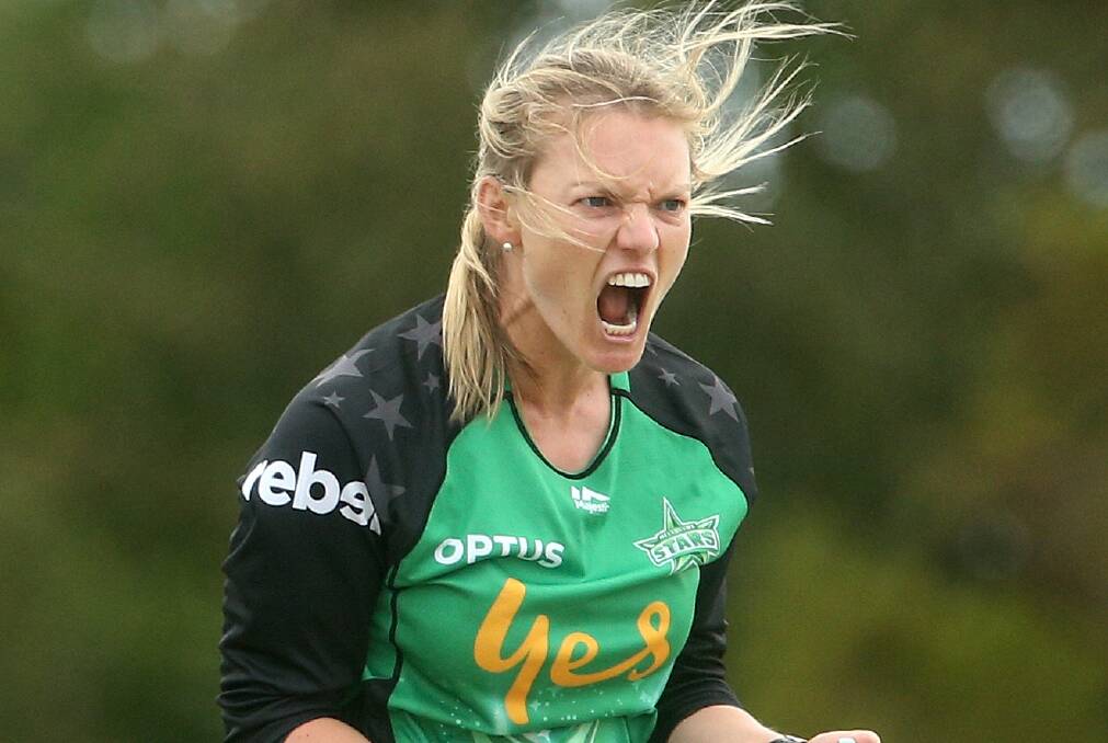 Green light: Kristen Beams out celebrating one of her wickets for Melbourne Stars. Picture: AAP