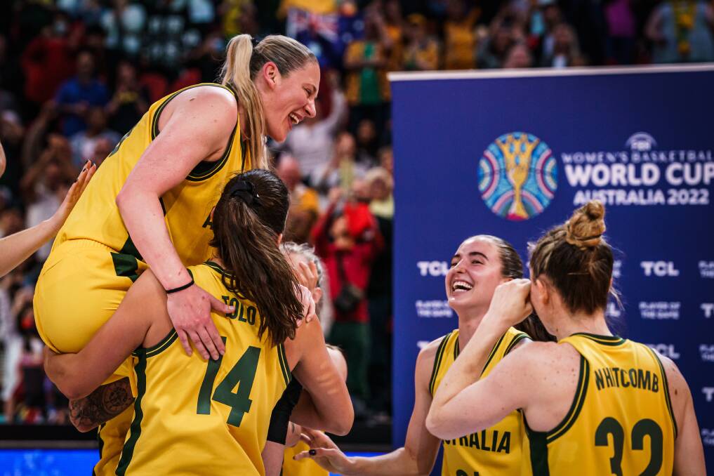 Australian basketball great Lauren Jackson gets chaired off by Launceston Tornado Marianna Tolo at the FIBA Womens Basketball World Cup in Sydney. Picture FIBA