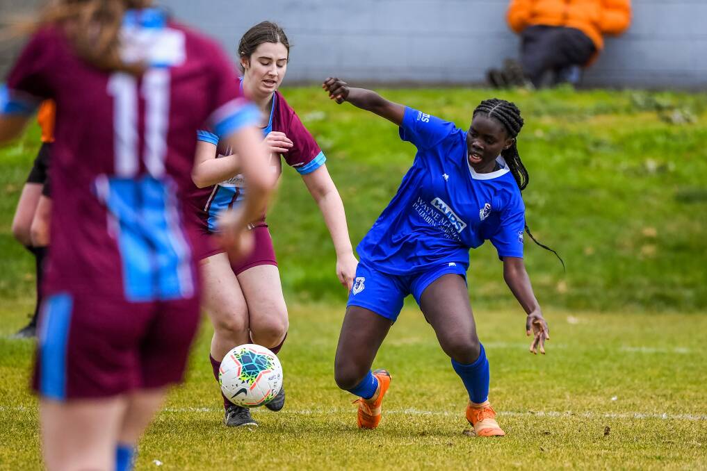 On the ball: Launceston United's Gonya Luate in action against Northern Rangers. Picture: Neil Richardson