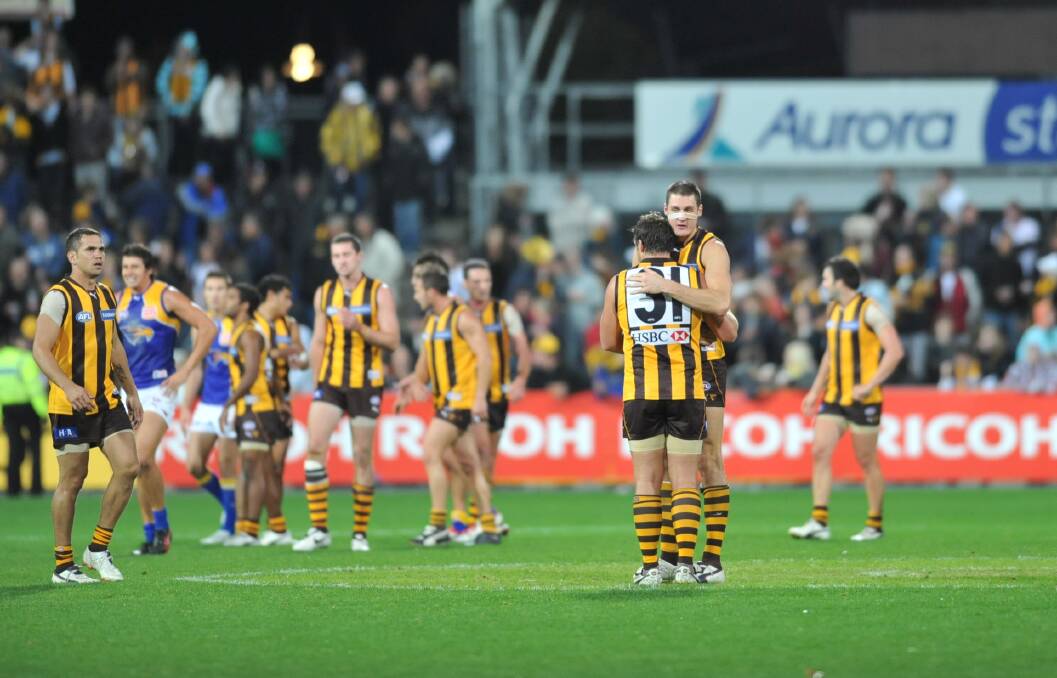 Hawthorn celebrate victory over West Coast in Launceston on Anzac Day 2009.