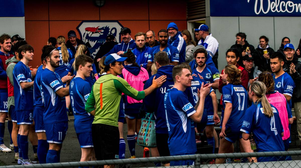 Launceston United's Northern Championship men's side applaud off the club's Women's Super League side after their victory against South Hobart on Saturday.