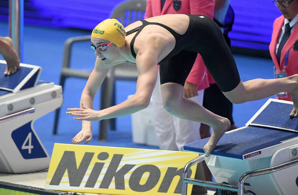 Ariarne Titmus dives in at the swimming world championships in South Korea. Picture: Delly Carr/Swimming Australia. 