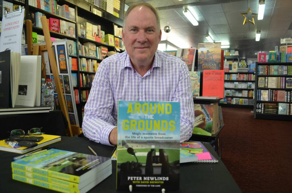 Grandstand: Peter Newlinds with his new book Around the Grounds at Petrarchs Launceston. Picture: Harry Murtough.