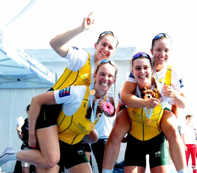 Green and gold: Sarah Hawe (front left) and her women's four crewmates Lucy Stephan, Katrina Werry and Olympia Aldersey celebrate their world title in Austria. Picture: Rowing Australia