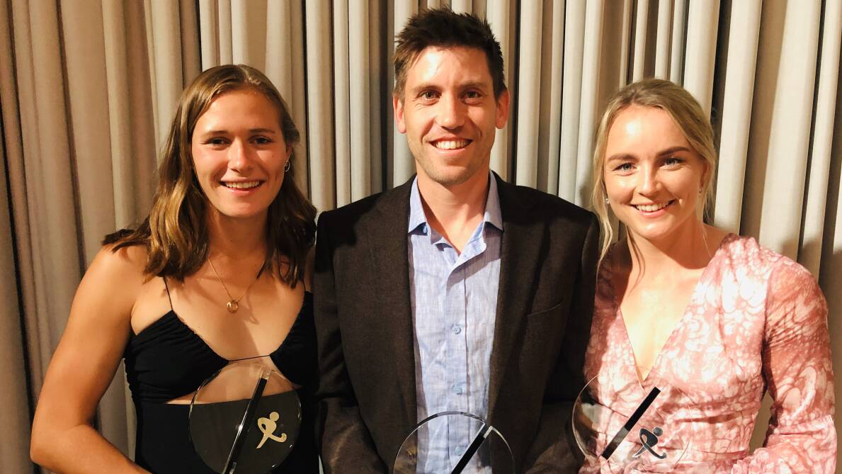 Golden year: Eddie Ockenden celebrates with Hockeyroos duo Jane Claxton and Kaitlin Nobbs after claiming the Australian hockey player of the year awards. Picture: Hockey Australia